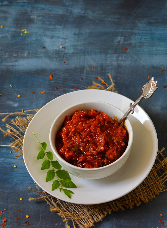 طرز تهیه ترشی گوجه فرنگی هندی تند و خوشمزه + تاریخچه جالب ترشی و شور