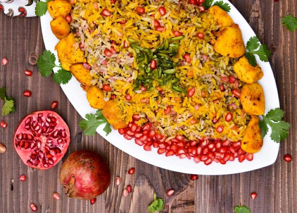 طرز تهیه ساده انار پلو مجلسی با مرغ برای شام شب یلدا+انار پلو شیرازی و قزوینی
