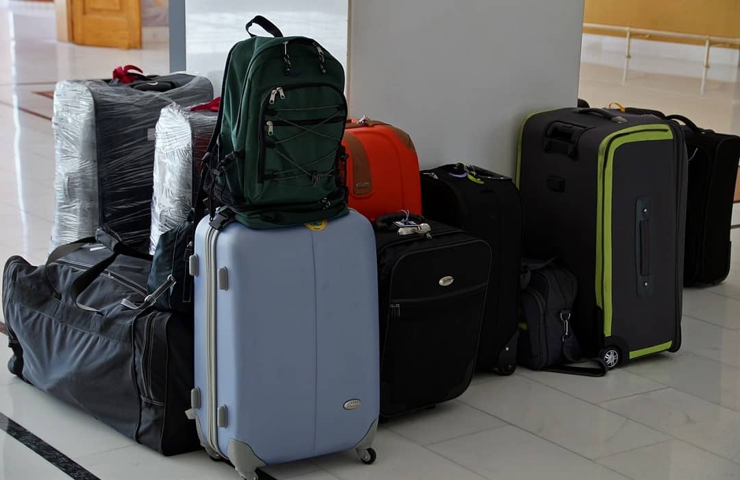 ۸ اصول و نحوه بستن چمدان برای مهاجرت که باید بدانید