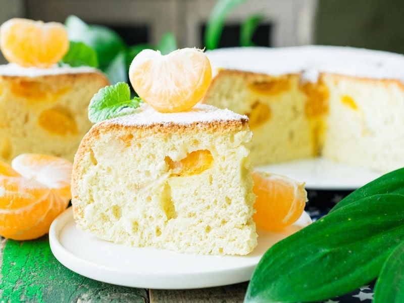 طرز تهیه کیک نارنگی با سس مخصوص به ۳ روش در فر و قابلمه